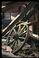 Old wheel in ruin