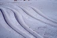 Car tracks in the sand